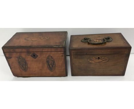 A George III mahogany and shell marquetry inlaid rectangular tea caddy, the top opening to reveal three brass canisters 18.5 
