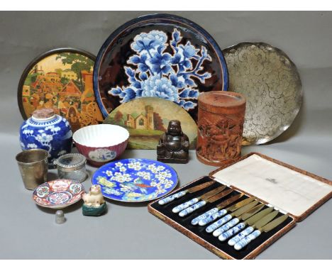 Japanese and Chinese porcelain plates and bowls, silver plated tray and beaker, Russian wood plaque, painted clock arch, bamb