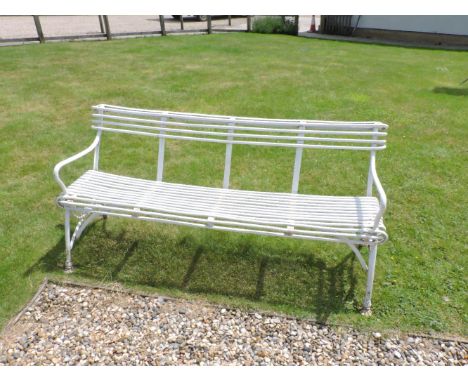 A Grassin A Arras white painted wrought iron garden seat, 160cm wide