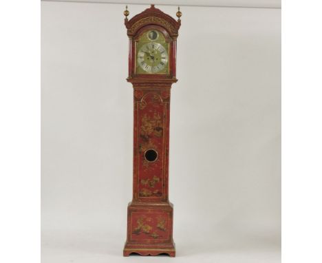 A George III red chinoiserie decorated longcase clock, the arched brass dial with tempus fugit father time automation above a