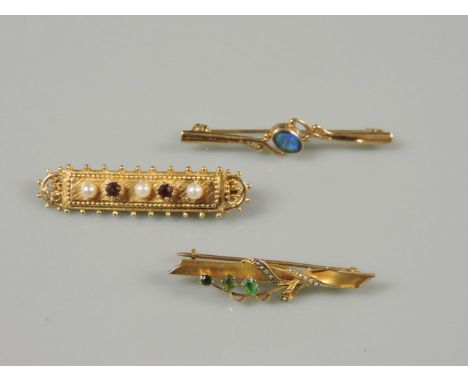 A 9ct gold garnet and cultured pearl brooch, a 9ct gold opal triplet bar brooch, and a gold bar brooch mounted with foliate s