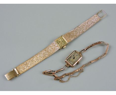 A 9ct gold ladies Rotary mechanical bracelet watch, with raised gilt and black enamel batons and link bracelet, and a 9ct gol