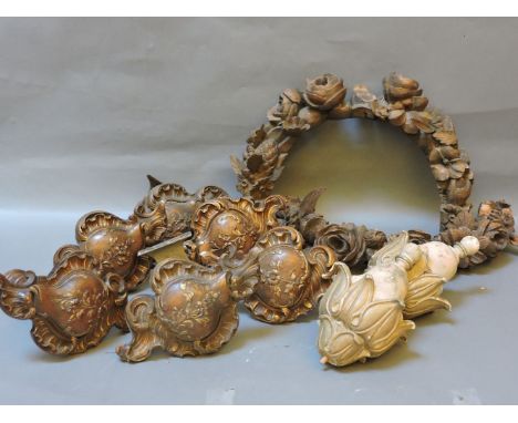 A box of carved wood curtain tie backs, and other items