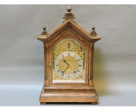 A late 19th century oak eight day striking bracket clock, by Winterhalder & Hofmeier, circa 1890, 44cm high