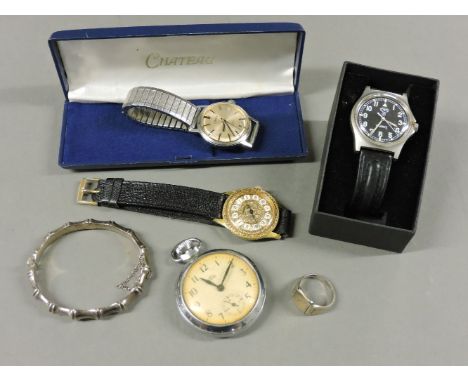 A sterling silver bamboo hinged bangle, a CWC gentleman's quartz strap watch, with black dial and military hands, a Summit go
