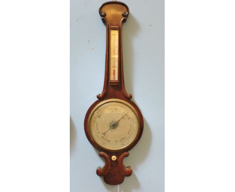 A 19th century mahogany barometer, with silvered dial and thermometer
