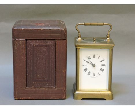 A French carriage clock, strike/repeat on a gong, with key and leather travelling case, circa 1880, later engraving