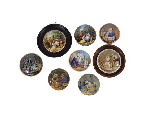 A 19th century Prattware transfer printed pot lid - decorated with 'Snap Dragon' scene, together with seven other Prattware l
