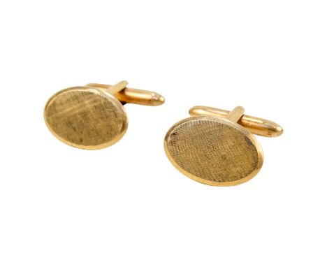 A pair of 9ct gold cufflinks - with oval engine turned pads on torpedo type backs, 10g