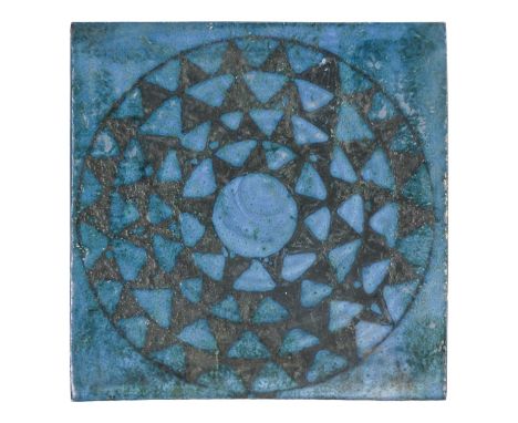 A Troika tile - St Ives, circa mid 1960's, blue glazed Aztec sun design, 15 x 15cm.