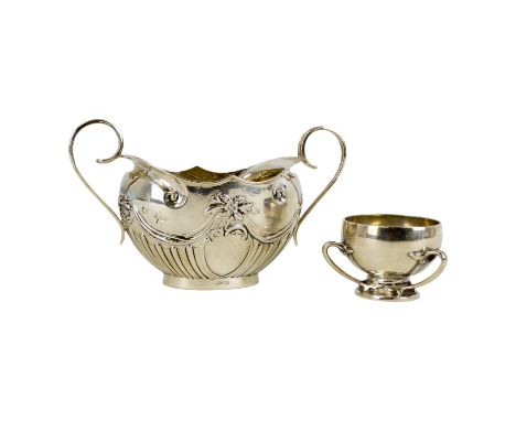 A silver Arts &amp; Crafts style miniature tyg cup - London 1901, Goldsmiths and Silversmiths Ltd, with foliate handles, 4cm 