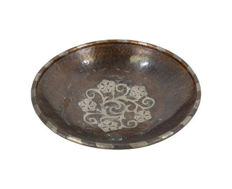 Hugh Wallis (British, 1871-1943) copper shallow bowl with pewter decoration, raised on three button feet, signed with initial