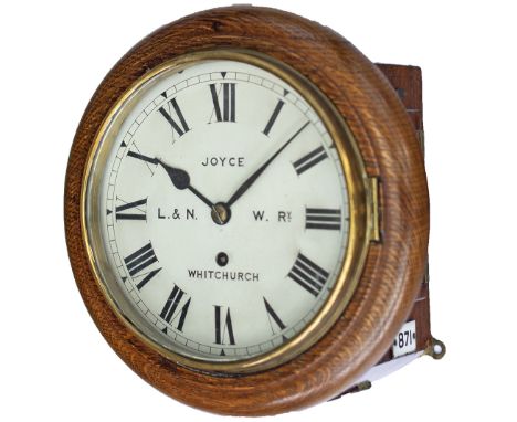 London &amp; North Western Railway 8 inch oak cased fusee railway clock with a spun brass bezel and a rectangular plated  Eng