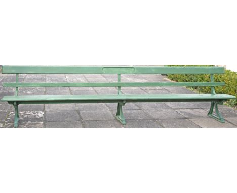 Great Northern Railway platform seat bench complete with original wood and three cast iron legs. Back rail has a cut out for 