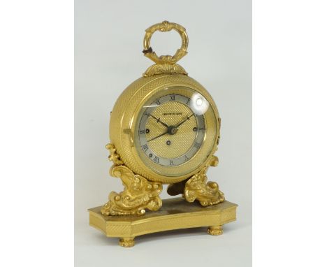 Ormolu fusee repeater mantle clock, engine turned circular form mounted by acanthus loop handle, Silvered chapter ring, Roman