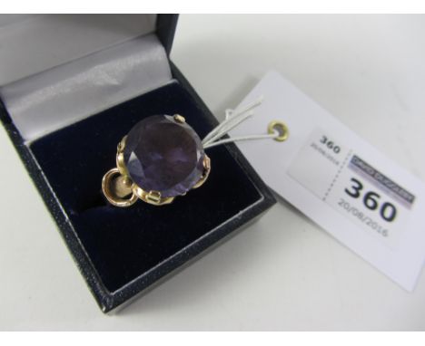 Ring set with a large amethyst stamped 9ct Condition Report Click here for further images, condition, auction times & deliver