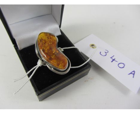Amber ring  Condition Report Click here for further images, condition, auction times & delivery costs