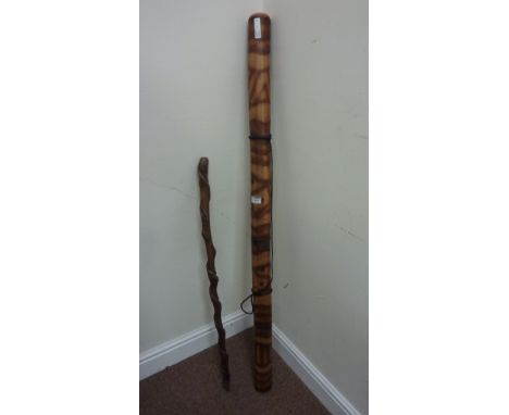 Didgeridoo and carved walking stick  Condition Report Click here for further images, condition, auction times & delivery cost