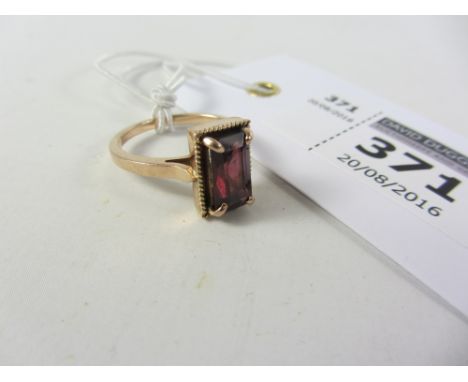 Ring set with a lozenge shaped garnet stamped 14k Condition Report Click here for further images, condition, auction times & 