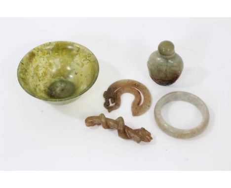 Small collection of Chinese jade, including a spinach jade bowl, 10cm diameter, a snuff bottle and stopper carved with a drag