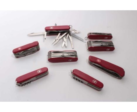 Group of eight Swiss Army folding multi bladed pocket knives (8)