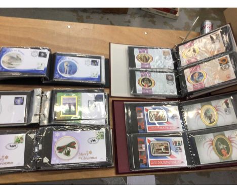 GB Benham silk first day covers in six albums and loose. Mostly 2000 onwards.