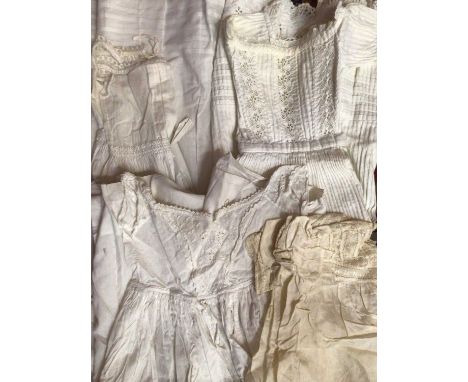 A lot of Victorian and Edwardian baby and children's clothing including cut-out work cropped bodice, heavy cotton and lace dr