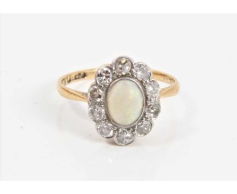 Edwardian 18ct gold opal and diamond cluster ring in millegrain setting, size K½Condition report: Weight 2.2 gramsOpal appear