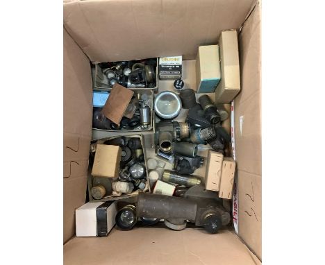 Box of camera lenses and accessories
