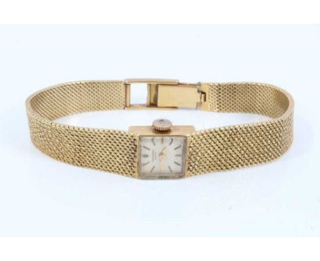 Ladies vintage Universal 18ct gold cased wristwatch on 18ct gold mesh braceletCondition report: Total weight 35.5 grams 