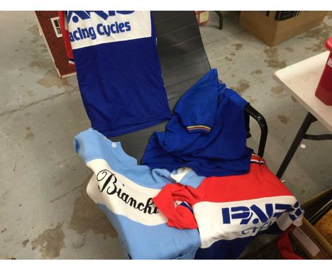 A bag of vintage cycling jerseys and clothing, including Bianchi, Paris, etcCondition report: There are 13 shirts in the lot,