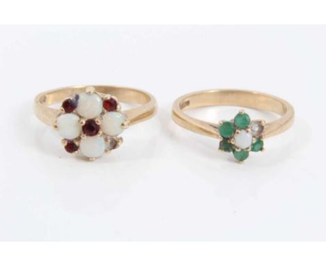 9ct gold opal and ruby cluster ring, size N and 9ct gold emerald and opal flower head ring, size L½Condition report: Opal rin