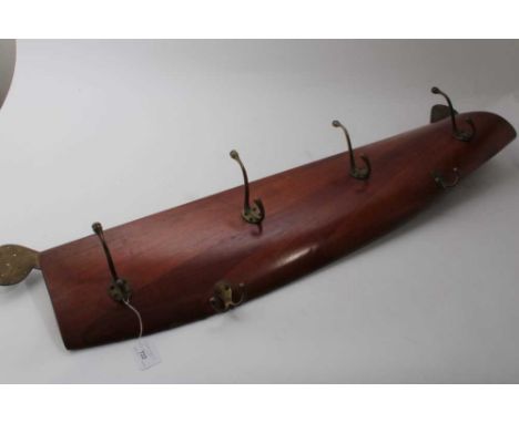 Unusual coat rack constructed from a fragment of an early 20th century aircraft propeller, 94.5cm in length (excluding bracke