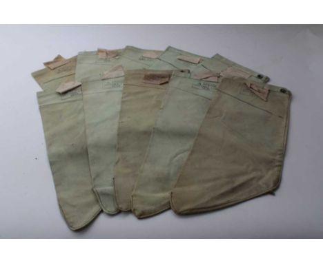Ten Second World War British military canvas webbing water filter bag, stamped with broad arrow and AF0005, Baynell Ltd, 1945
