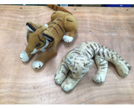 Two Steiff mohair tigers (one large one small) with button in ear, and one Merrythought tiger  