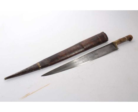 19th century Khyber knife, with tapered steel blade, brass mount and ribbed horn grips, in leather covered sheath, blade 40cm