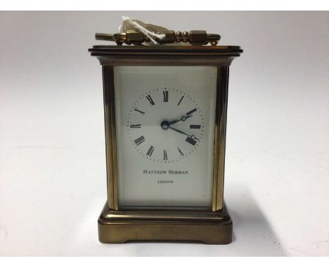 Brass Matthew Norman carriage clock with key