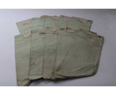 Ten Second World War British military canvas webbing water filter bag, stamped with broad arrow and AF0005, Baynell Ltd, 1945