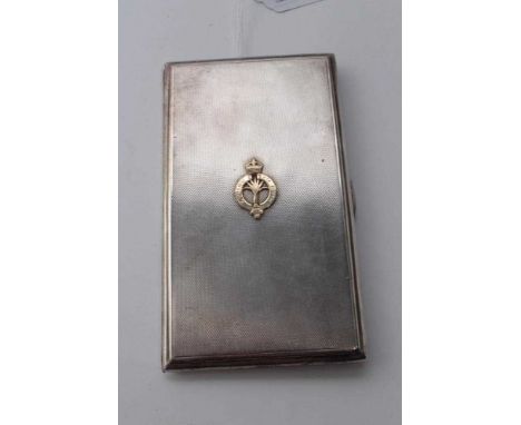 Second World War period silver cigarette case of rectangular form with engine turned decoration and applied gold Welsh Guards