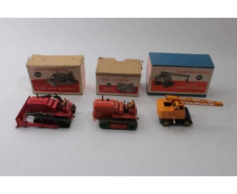 Dinky Supertoy Blaw Knox Bulldozer No561, Heavy Tractor No563 and a Coles Mobile Crane No571 all boxed