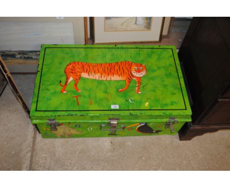 A painted metal trunk, decorated with a tiger and other jungle animals 
