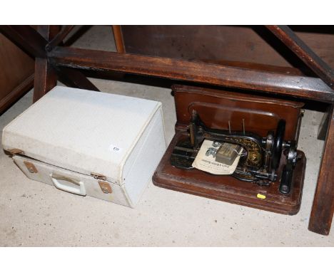 A Bradbury & Co. vintage sewing machine and a Viking sewing machine - sold as a collector's item 