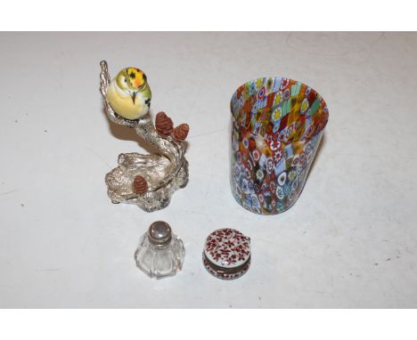 An Art Glass beaker; a glass bottle with silver lid; a pill box and a bird ornament with silver mount