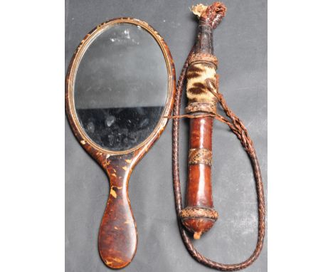 A late 19th century Victorian circa 1890’s tortoise shell and mother of pearl mirror / hand mirror. The mirror of an oval for
