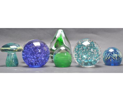 A collection of eight vintage retro mid 20th century studio art glass paperweights. The collection include Mdina paperweight 