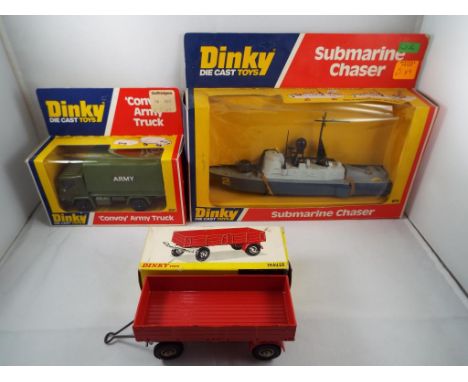 Dinky - three diecast vehicles in original boxes, comprising  #673 Submarine Chaser, #687 Convoy Army Truck and #428 Trailer 