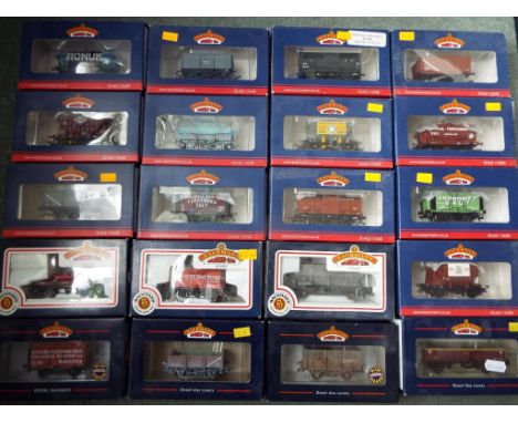 Bachmann - twenty OO gauge goods wagons and similar rolling stock, all appear mint in original window boxes (some dusty) - Es