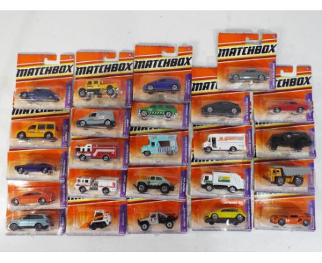 Matchbox - 24 diecast vehicles in original blister packs from the 2000's, comprising #23 68 Citroen DS, #22 VW Karmann Ghia, 