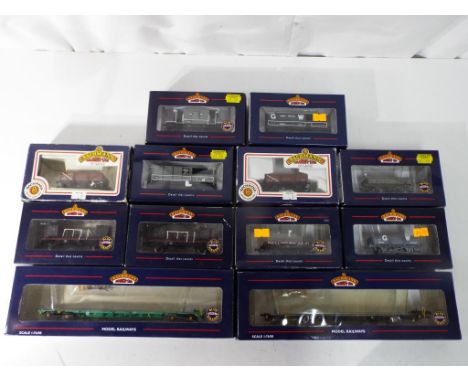 Model Railways - twelve Bachmann OO gauge wagons in original boxes to include 33-078 a five plank China Clay wagon weathered,