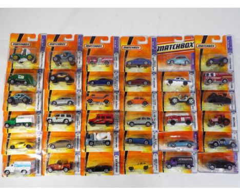 Matchbox - 36 diecast vehicles in original blister packs, comprising #9 61 Jaguar E Type Coupe, #4 Volvo C30, 2008 Toyota Pri